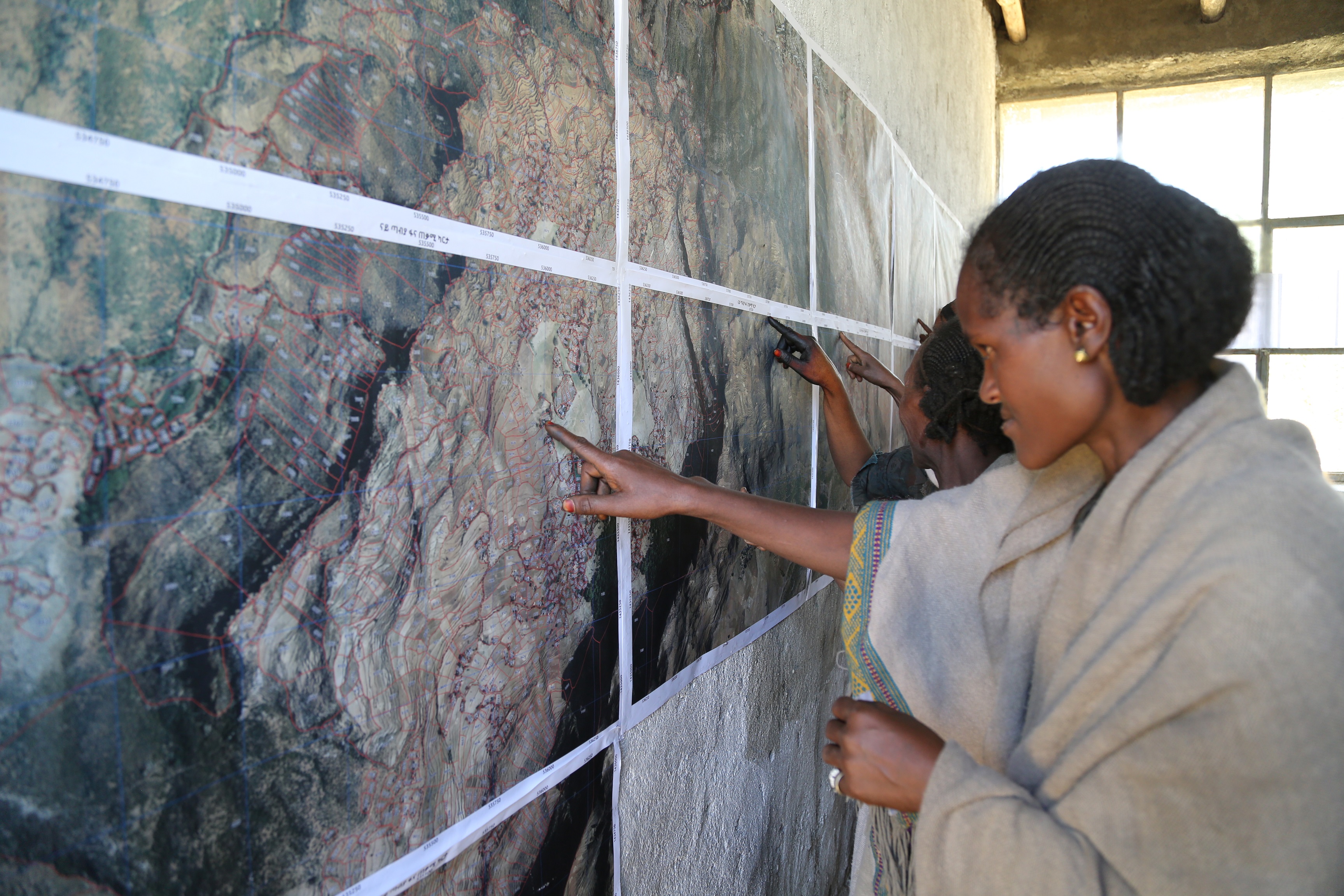 A Woman Farmer  Referring  to  Spatial Data, Emba Alaje, Tigray.JPG