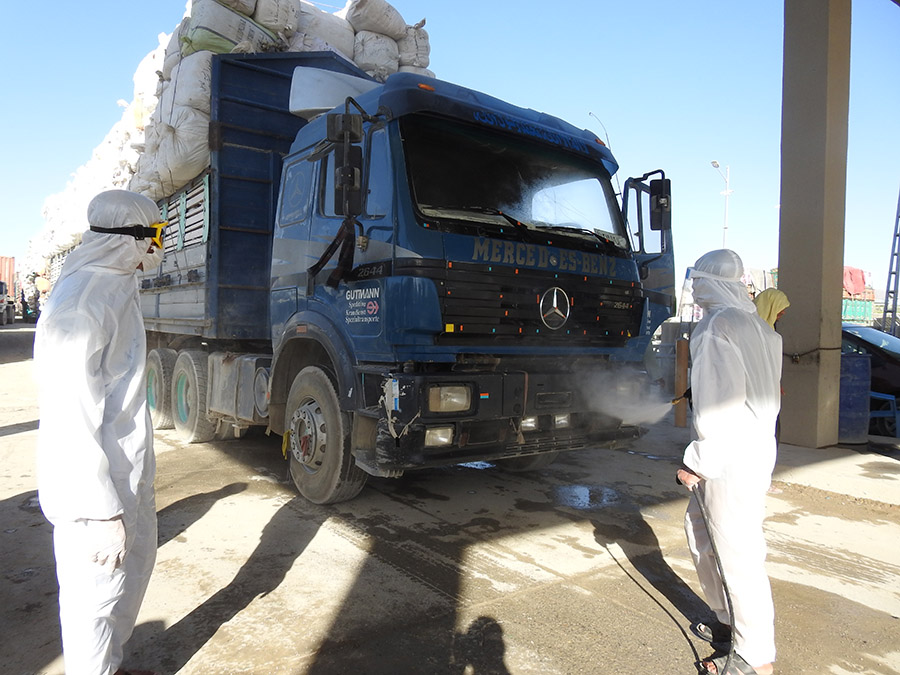 AVC-HVC trained personnel spraying trucks entering and leaving through Torkham port, June 20, 2020[1]-fcc9d2.JPG