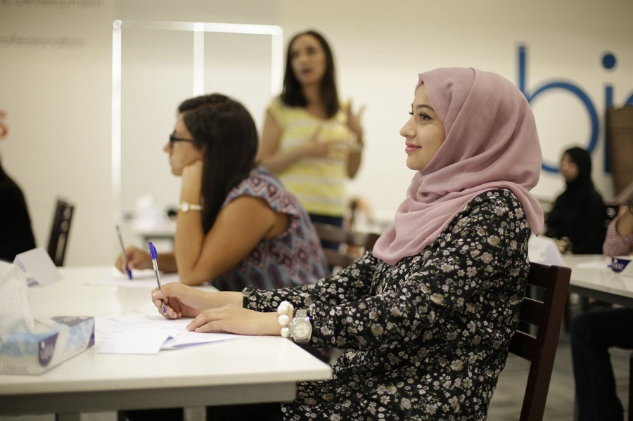 JCP - woman in lecture.jpg