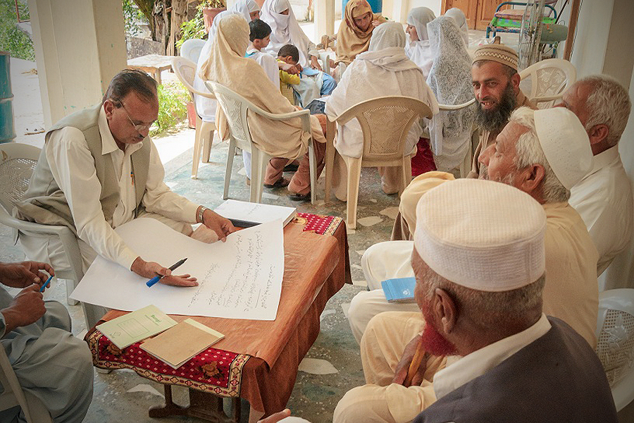Group planning session in Pakistan