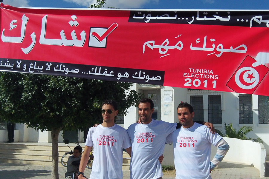 Photo of men at an election rally