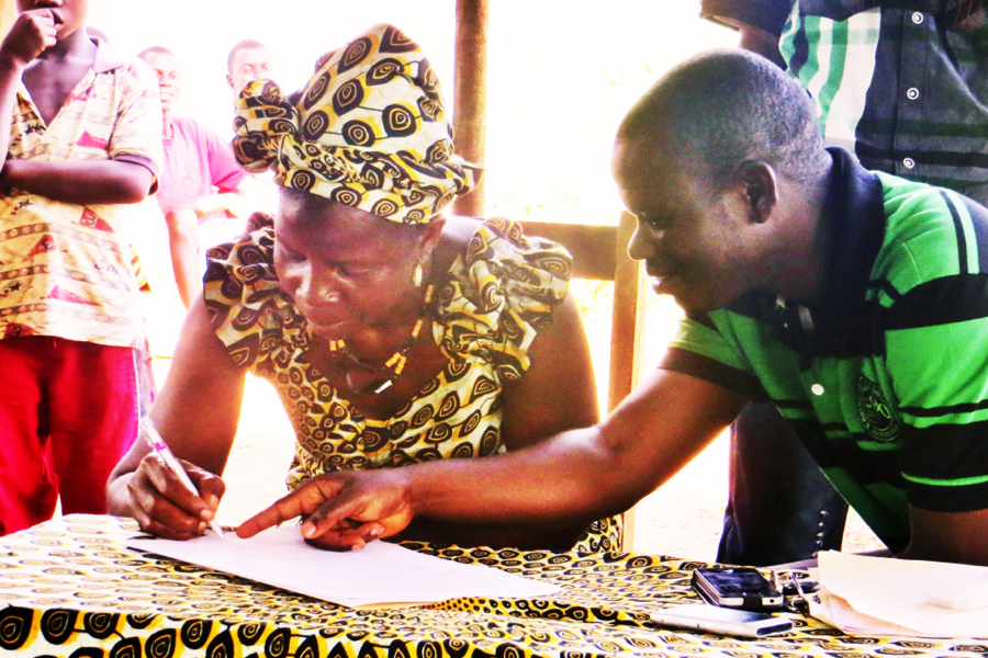 Photo of a contract signing for an agricultural loan