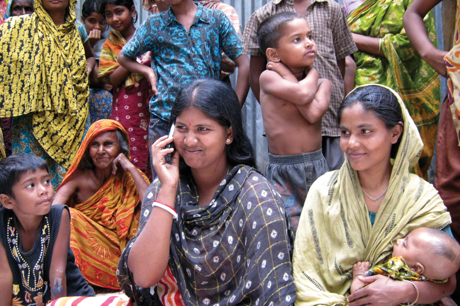 Photo of a woman in Bangladesh talking on the phone