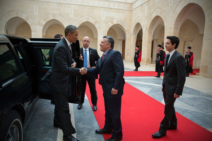 Photo of President Barack Obama being greeted by King Abdullah II of Jordan.