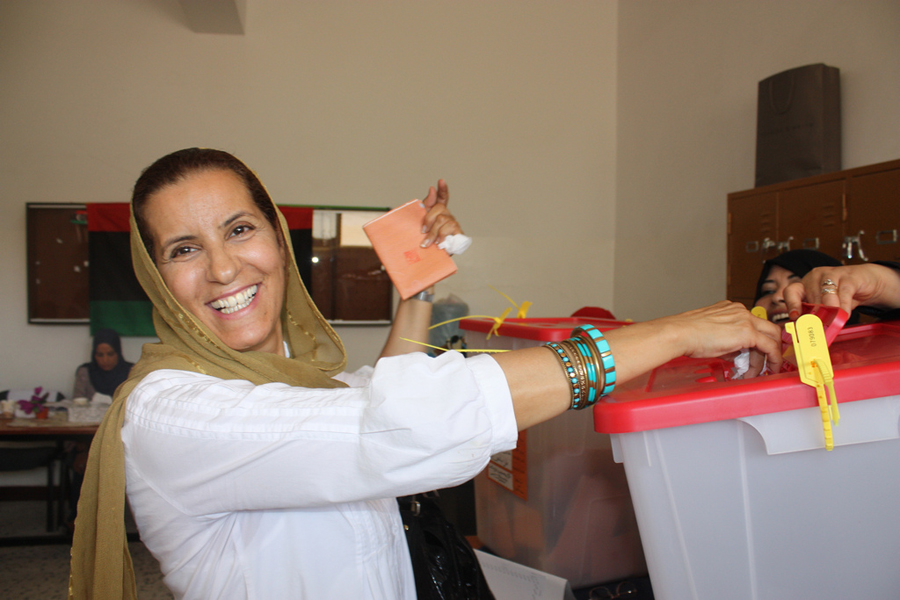 Photo of a Libyan woman voting during the General National Congress Elections.
