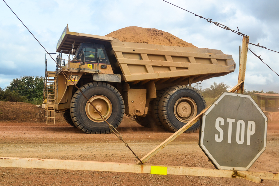 Photo of giant dump truck moving earth in Ghana.